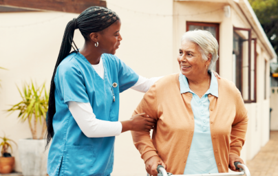 woman assisting elderly