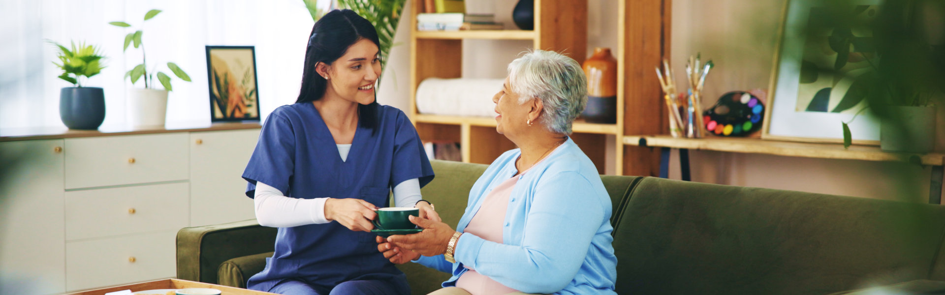 Nurse interacting warmly with patient