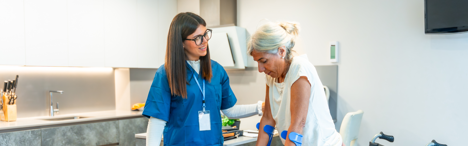 woman assisting elderly