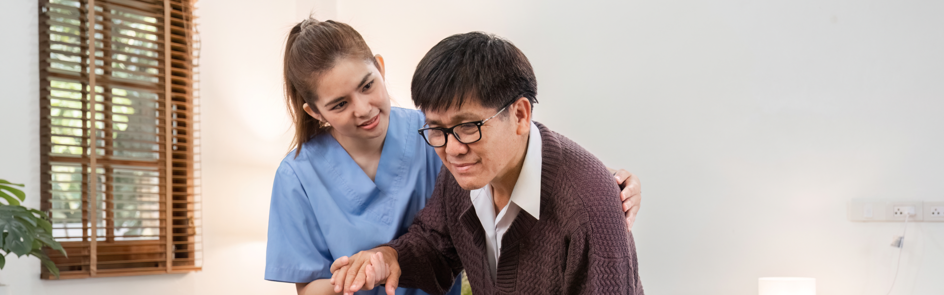 woman assisting elderly